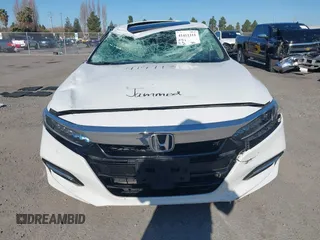 2020 Honda Accord Touring with VIN 1HGCV3F99LA008992, listed as a IAAI auction lot 41411311 with 93,936 mi miles and . Bid and sale history available at DreamBid. Image 13.