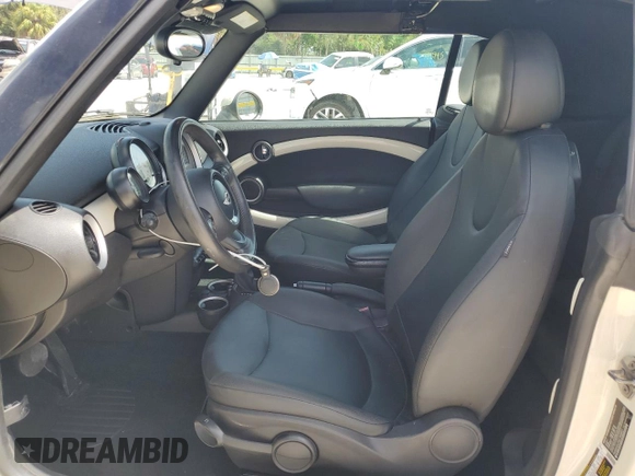2014 MINI Convertible с VIN WMWZN3C56ET569651, выставлен на аукционе Copart как лот 66455675 с пробегом 117 994 миль миль и Списание • Salvage title. История ставок и продаж доступна на DreamBid. Изображение 7.
