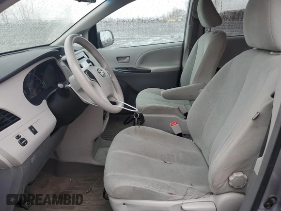 2012 Toyota Sienna with VIN 5TDZK3DC1CS213175, listed as a Copart auction lot 55475615 with 216,082 mi miles and Salvage title. Bid and sale history available at DreamBid. Image 7.