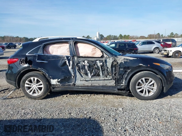 2014 Infiniti QX70 with VIN JN8CS1MU2EM451932, listed as a IAAI auction lot 41439834 with 125,781 mi miles and . Bid and sale history available at DreamBid. Image 13.