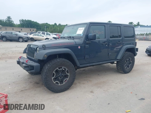 2016 Jeep Wrangler Unlimited Rubicon with VIN 1C4HJWFG6GL346862, listed as a IAAI auction lot 42441610 with 94,227 mi miles and . Bid and sale history available at DreamBid. Image 2.