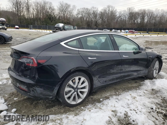 2020 Tesla Model 3 Standard Range Plus with VIN 5YJ3E1EAXLF661031, listed as a Copart auction lot 87912605 with Not Provided miles and Salvage Title. Bid and sale history available at DreamBid. Image 3.