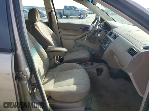 2005 Ford Focus S with VIN 1FAFP34N35W141023, listed as a Copart auction lot 84230574 with 244,545 mi miles and Salvage Title. Bid and sale history available at carsss.com. Image 7.