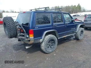 2000 Jeep Cherokee Classic with VIN 1J4FF58SXYL163514, listed as a IAAI auction lot 41920054 with 259,677 mi miles. Bid and sale history available at carsss.com. Image 4.