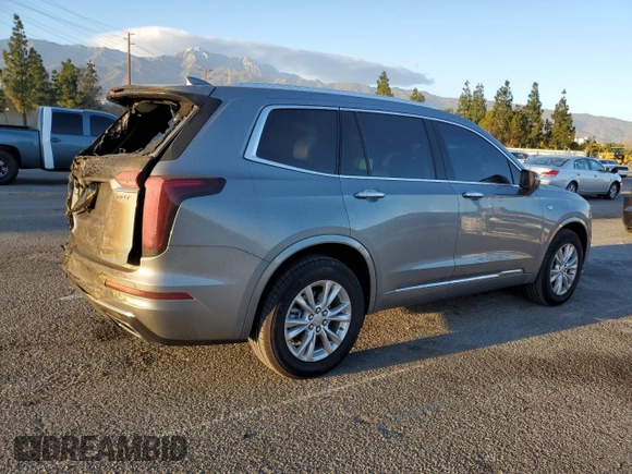 2024 Cadillac XT6 FWD Luxury with VIN 1GYKPAR40RZ744121, listed as a Copart auction lot 86413604 with 7,527 mi miles and Salvage Title. Bid and sale history available at carsss.com. Image 3.