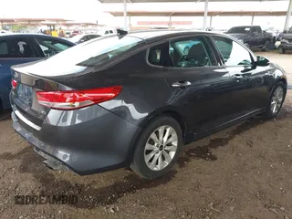 2017 Kia Optima EX with VIN 5XXGU4L36HG125627, listed as a IAAI auction lot 41949580 with 123,548 mi miles. Bid and sale history available at carsss.com. Image 4.