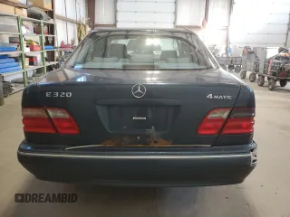 2000 Mercedes-Benz E-Class AWD with VIN WDBJF82G4YX027683, listed as a Copart auction lot 77146524 with 228,654 mi miles and Clean Title. Bid and sale history available at carsss.com. Image 6.