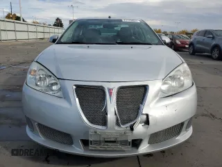 2009 Pontiac G6 with VIN 1G2ZL577094232011, listed as a Copart auction lot 77175054 with 133,353 mi miles and Salvage title. Bid and sale history available at DreamBid. Image 5.