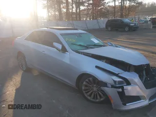 2018 Cadillac CTS Luxury RWD z VIN 1G6AR5SX0J0128244, wystawiony jako IAAI lot #41728369 z przebiegiem 56 980 mil mil oraz . Historia ofert i sprzedaży dostępna na DreamBid. Obrazek 1.