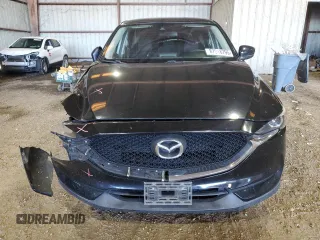 2017 Mazda CX-5 Sport with VIN JM3KFABL9H0210264, listed as a Copart auction lot 87918795 with 129,827 mi miles and Salvage Title. Bid and sale history available at carsss.com. Image 5.