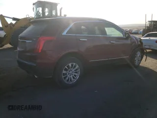 2018 Cadillac XT5 FWD with VIN 1GYKNARS2JZ241702, listed as a Copart auction lot 84031294 with 67,866 mi miles and Salvage title. Bid and sale history available at DreamBid. Image 3.