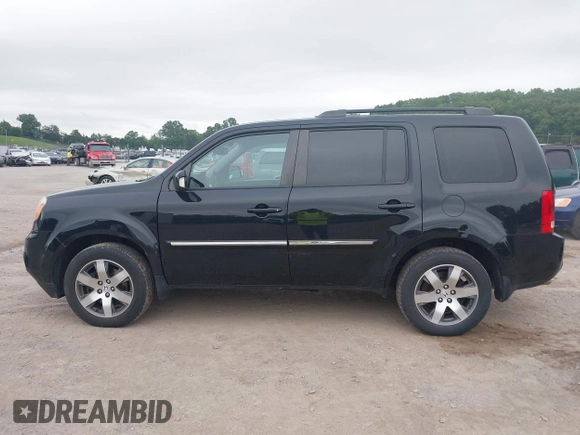 2015 Honda Pilot Touring with VIN 5FNYF4H9XFB036493, listed as a IAAI auction lot 42190624 with 223,675 mi miles and . Bid and sale history available at DreamBid. Image 14.