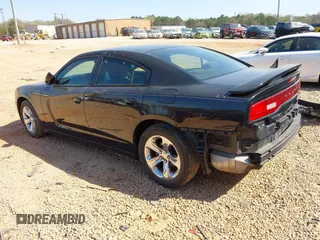 2014 Dodge Charger SE with VIN 2C3CDXBG4EH137969, listed as a IAAI auction lot 41909252 with 149,126 mi miles and . Bid and sale history available at carsss.com. Image 3.