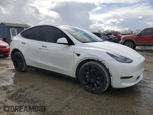 2022 Tesla Model Y Long Range with VIN 7SAYGDEE2NF403385, listed as a Copart auction lot 48594095 with 39,443 mi miles and Salvage Title. Bid and sale history available at DreamBid. Image 4.
