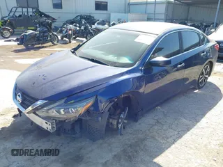 2016 Nissan Altima SL with VIN 1N4AL3AP3GC290953, listed as a IAAI auction lot 42003026 with 153,869 mi miles and . Bid and sale history available at carsss.com. Image 2.