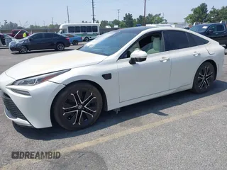 2022 Toyota Mirai XLE с VIN JTDAAAAA4NA005508, выставлен на аукционе IAAI как лот 42497748 с пробегом 29 745 миль миль и . История ставок и продаж доступна на DreamBid. Изображение 2.