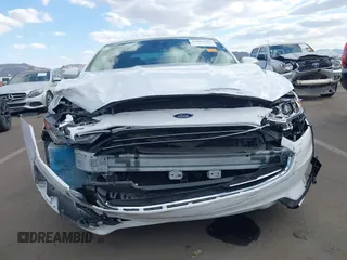 2020 Ford Fusion SE with VIN 3FA6P0HD6LR252987, listed as a IAAI auction lot 42064351 with 63,832 mi miles and . Bid and sale history available at carsss.com. Image 6.