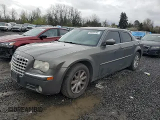 2008 Chrysler 300 Limited with VIN 2C3KA33G28H297297, listed as a Copart auction lot 50999185 with 140,756 mi miles and Salvage title. Bid and sale history available at DreamBid. Image 1.