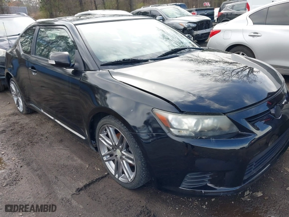 2011 Scion tC with VIN JTKJF5C74B3014552, listed as a IAAI auction lot 42004369 with 232,588 mi miles. Bid and sale history available at carsss.com. Image 6.
