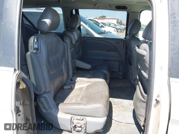 2005 Honda Odyssey EX-L z VIN 5FNRL38765B135803, wystawiony jako IAAI lot #42421288 z przebiegiem 185 043 mil mil oraz . Historia ofert i sprzedaży dostępna na DreamBid. Obrazek 8.