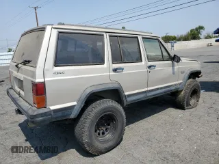 1996 Jeep Cherokee Sport with VIN 1J4FJ68S4TL146513, listed as a Copart auction lot 71039984 with 330,765 mi miles and Clean Title. Bid and sale history available at carsss.com. Image 3.