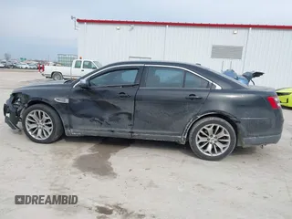 2015 Ford Taurus Limited with VIN 1FAHP2F89FG118397, listed as a IAAI auction lot 41662964 with 185,354 mi miles and . Bid and sale history available at DreamBid. Image 15.