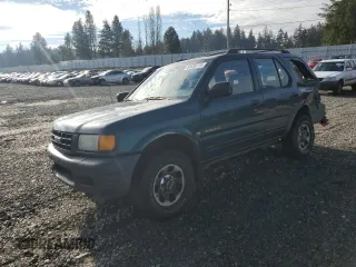1999 Isuzu Rodeo S with VIN 4S2CM58W7X4359649, listed as a Copart auction lot 83450174 with 171,940 mi miles and Salvage Title. Bid and sale history available at carsss.com. Image 1.