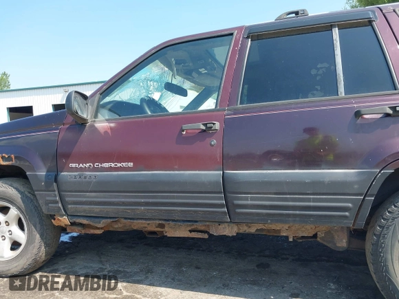 1997 Jeep Grand Cherokee Laredo with VIN 1J4GZ58S0VC708420, listed as a IAAI auction lot 42624603 with Not provided miles and . Bid and sale history available at DreamBid. Image 13.