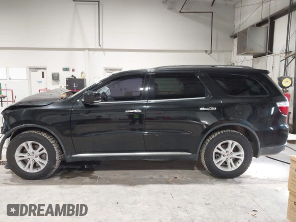 2013 Dodge Durango Crew with VIN 1C4SDJDT9DC670738, listed as a IAAI auction lot 41329419 with 149,520 mi miles and . Bid and sale history available at DreamBid. Image 15.