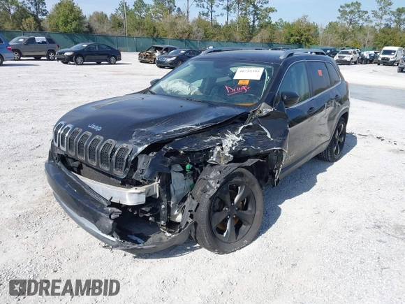 2014 Jeep Cherokee Limited with VIN 1C4PJLDS6EW114842, listed as a IAAI auction lot 41735395 with 157,261 mi miles and . Bid and sale history available at DreamBid. Image 17.