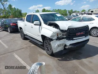 2019 GMC Canyon 4WD SLE z VIN 1GTG6CENXK1319647, wystawiony jako IAAI lot #42039568 z przebiegiem 56 371 mil mil oraz . Historia ofert i sprzedaży dostępna na DreamBid. Obrazek 1.