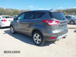 2014 Ford Escape SE with VIN 1FMCU9G99EUB13371, listed as a IAAI auction lot 42167417 with 140,145 mi miles and . Bid and sale history available at DreamBid. Image 3.