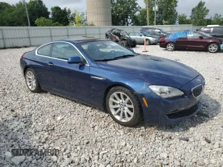 2014 BMW 6 Series z VIN WBALY1C59EDZ73460, wystawiony jako Copart lot #64846204 z przebiegiem 58 876 mil mil oraz Czysty tytuł • Clean title. Historia ofert i sprzedaży dostępna na DreamBid. Obrazek 4.
