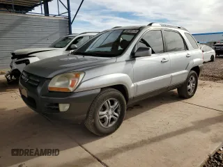 2006 Kia Sportage LX with VIN KNDJF723567206000, listed as a Copart auction lot 82759174 with 130,588 mi miles and Salvage Title. Bid and sale history available at DreamBid. Image 1.