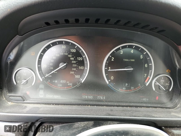 2014 BMW 5 Series 535i xDrive z VIN WBA5B3C50ED535321, wystawiony jako Copart lot #57020725 z przebiegiem 178 165 mil mil oraz Szkoda całkowita • Salvage title. Historia ofert i sprzedaży dostępna na DreamBid. Obrazek 9.