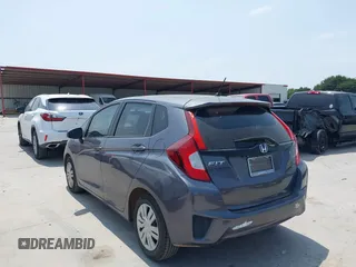 2015 Honda Fit LX with VIN 3HGGK5H55FM724750, listed as a IAAI auction lot 42282137 with 32,696 mi miles and . Bid and sale history available at DreamBid. Image 3.