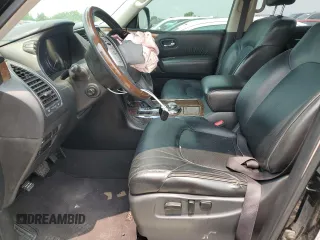 2017 Infiniti QX80 with VIN JN8AZ2NEXH9151613, listed as a Copart auction lot 55811025 with 286,125 mi miles and Salvage title. Bid and sale history available at DreamBid. Image 7.