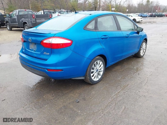 2014 Ford Fiesta SE with VIN 3FADP4BJ6EM204449, listed as a IAAI auction lot 41992813 with 92,026 mi miles. Bid and sale history available at carsss.com. Image 4.