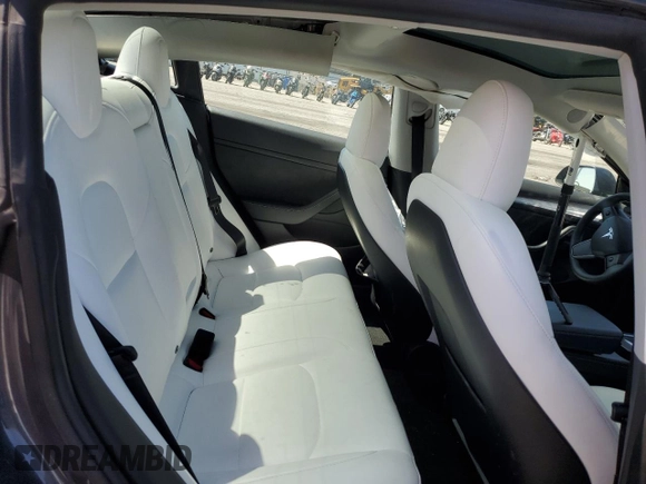 2023 Tesla Model 3 z VIN 5YJ3E1EA4PF619007, wystawiony jako Copart lot #57712685 z przebiegiem 30 855 mil mil oraz Szkoda całkowita • Salvage title. Historia ofert i sprzedaży dostępna na DreamBid. Obrazek 10.