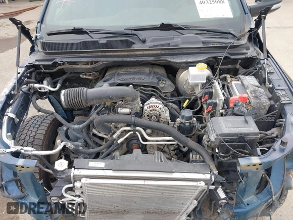 2019 Ram 1500 Big Horn/Lone Star with VIN 1C6SRFFT7KN663677, listed as a IAAI auction lot 40325088 with 77,035 mi miles. Bid and sale history available at carsss.com. Image 10.