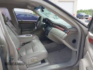 2003 Cadillac DeVille z VIN 1G6KD54Y73U130593, wystawiony jako IAAI lot #42377235 z przebiegiem 133 656 mil mil oraz . Historia ofert i sprzedaży dostępna na DreamBid. Obrazek 5.