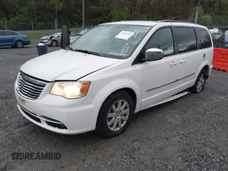 2012 Chrysler Town & Country Touring L with VIN 2C4RC1CG6CR137841, listed as a IAAI auction lot 41951936 with 264,211 mi miles and . Bid and sale history available at carsss.com. Image 19.