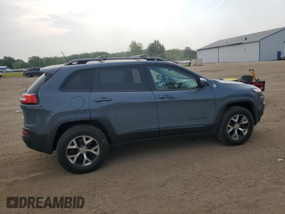 2014 Jeep Cherokee Trailhawk with VIN 1C4PJMBS4EW160341, listed as a Copart auction lot 60761475 with 135,087 mi miles and Salvage title. Bid and sale history available at DreamBid. Image 3.