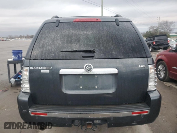 2010 Mercury Mountaineer Premier with VIN 4M2EN4JE6AUJ00908, listed as a Copart auction lot 82547814 with 219,800 mi miles and Salvage Title. Bid and sale history available at carsss.com. Image 6.