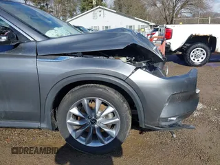 2020 Infiniti QX50 Luxe z VIN 3PCAJ5M38LF112019, wystawiony jako IAAI lot #41395539 z przebiegiem 35 908 mil mil oraz . Historia ofert i sprzedaży dostępna na DreamBid. Obrazek 18.