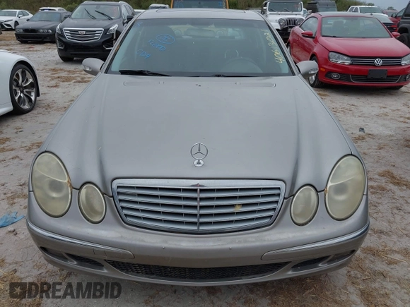 2006 Mercedes-Benz E-Class 3.5L with VIN WDBUF56J16A795803, listed as a IAAI auction lot 40613021 with 1 mi miles. Bid and sale history available at carsss.com. Image 12.