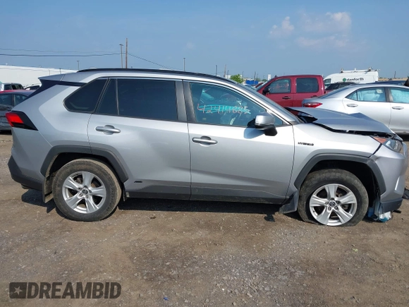 2020 Toyota RAV4 Hybrid XLE z VIN 2T3RWRFVXLW054810, wystawiony jako IAAI lot #42411211 z przebiegiem 94 523 mil mil oraz . Historia ofert i sprzedaży dostępna na DreamBid. Obrazek 13.