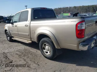 2004 Toyota Tundra SR5 with VIN 5TBET34144S447959, listed as a IAAI auction lot 41752378 with 301,993 mi miles and . Bid and sale history available at DreamBid. Image 3.