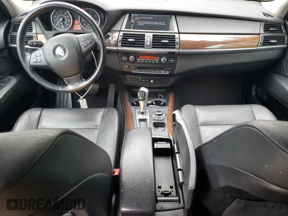 2012 BMW X5 35d with VIN 5UXZW0C54CL671377, listed as a Copart auction lot 60936395 with 105,903 mi miles and Salvage title. Bid and sale history available at DreamBid. Image 8.