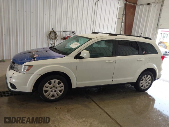 2019 Dodge Journey SE with VIN 3C4PDCBBXKT835029, listed as a IAAI auction lot 42120482 with 130,282 mi miles and . Bid and sale history available at DreamBid. Image 14.